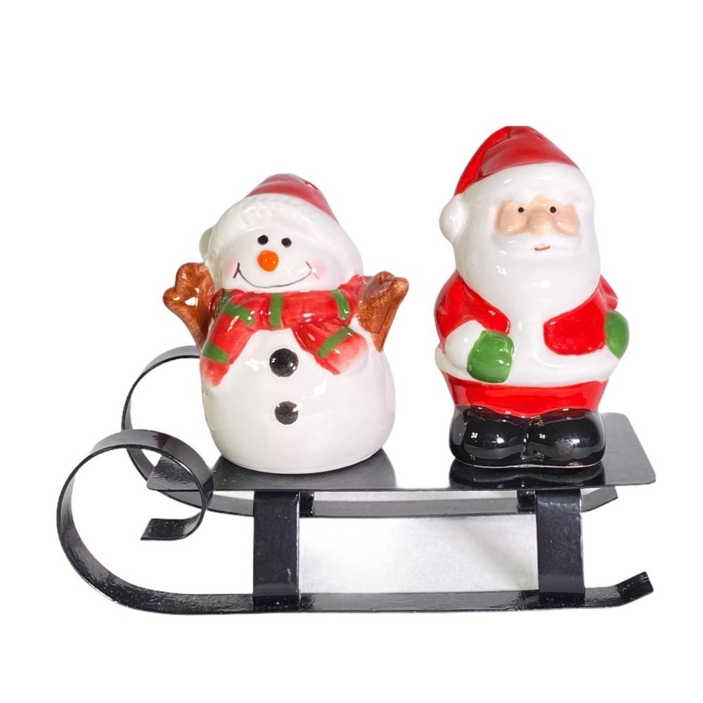Santa‎ And Snowman On Sled Salt and Pepper Shakers Set